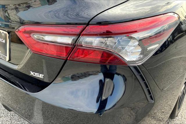 Photo of 2023 Midnight Black Metallic Toyota Camry