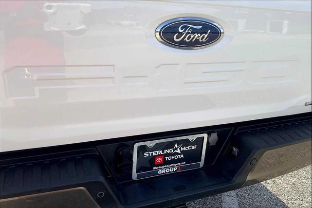 Photo of 2023 Star White Metallic Tri-Coat/Stone Gray Ford F-150