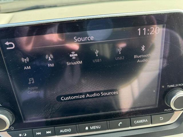 Photo of 2023 Pearl White Tricoat Nissan Rogue