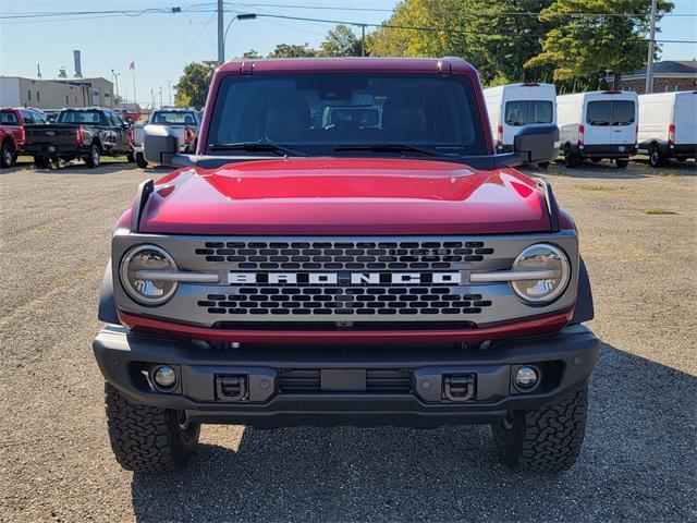 Photo of 2025 Ruby Red Metallic Tinted Clearcoat Ford Bronco