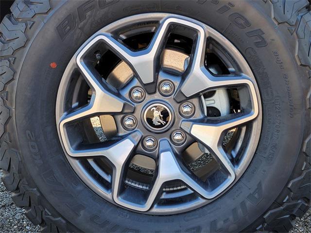Photo of 2025 Ruby Red Metallic Tinted Clearcoat Ford Bronco