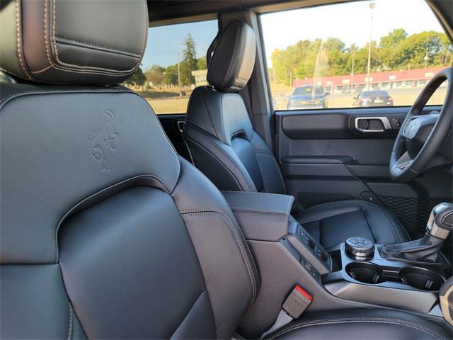 Photo of 2025 Ruby Red Metallic Tinted Clearcoat Ford Bronco