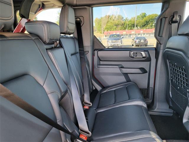 Photo of 2025 Ruby Red Metallic Tinted Clearcoat Ford Bronco