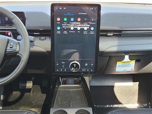 Photo of 2025 Star White Metallic Tri-Coat Ford Mustang Mach-E