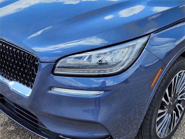 Photo of 2022 Ocean Drive Blue Metallic Tinted Clearciat Lincoln Corsair