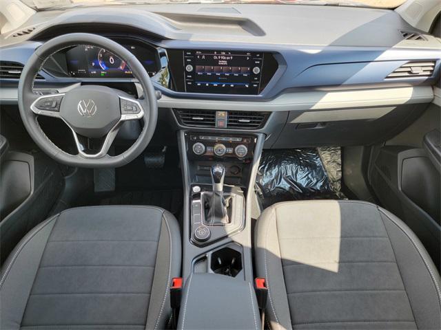 Photo of 2024 Deep Black Pearl Volkswagen Taos