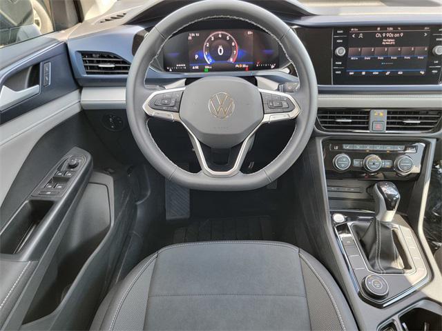 Photo of 2024 Deep Black Pearl Volkswagen Taos