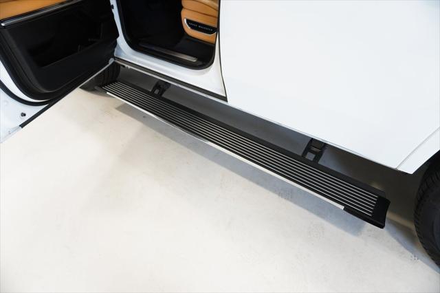 Photo of 2023 Bright White Clearcoat Jeep Grand Wagoneer