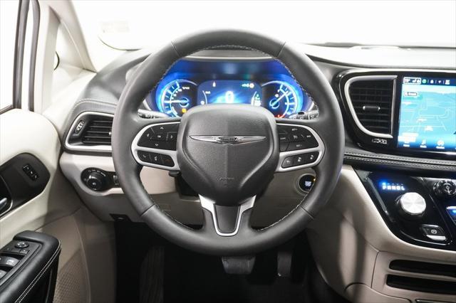 Photo of 2024 Bright White Clearcoat Chrysler Pacifica Hybrid