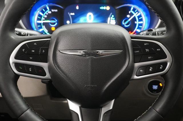 Photo of 2024 Bright White Clearcoat Chrysler Pacifica Hybrid
