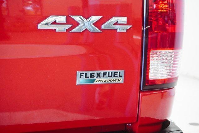 Photo of 2016 Flame Red Clearcoat RAM 1500