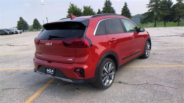 Photo of 2022 Solar Orange Kia Niro
