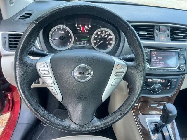 Photo of 2015 Cayenne Red Nissan Sentra
