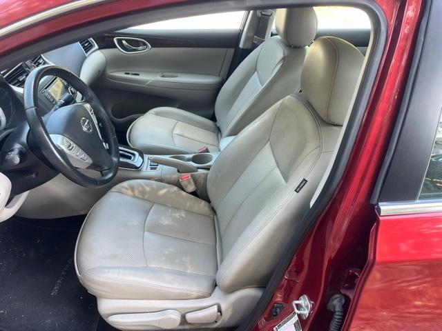Photo of 2015 Cayenne Red Nissan Sentra