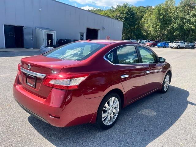 Photo of 2015 Cayenne Red Nissan Sentra