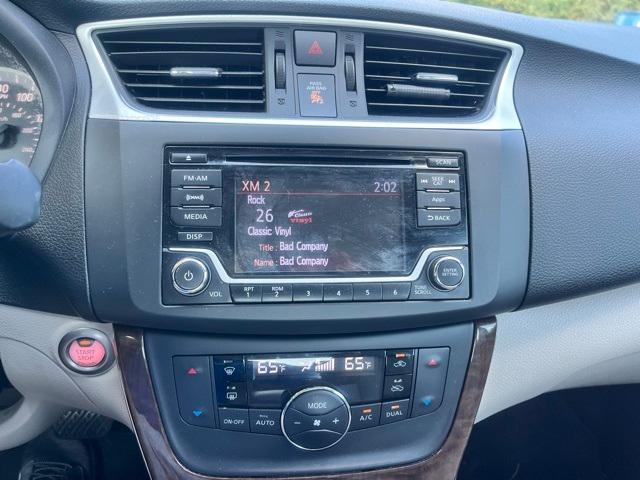 Photo of 2015 Cayenne Red Nissan Sentra