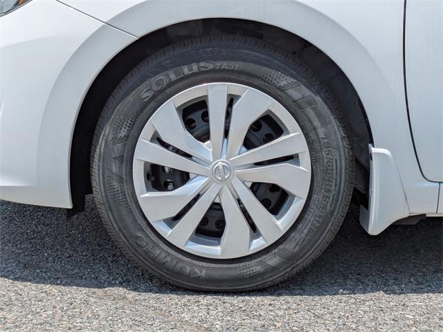 Photo of 2025 Cloud White Nissan Versa