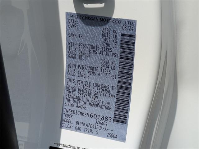 Photo of 2025 Glacier White Nissan Frontier