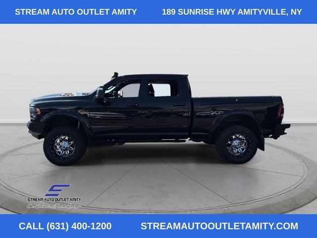 Photo of 2023 Diamond Black Crystal Pearlcoat RAM 2500
