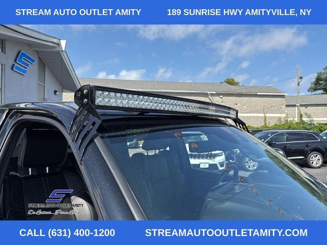 Photo of 2023 Diamond Black Crystal Pearlcoat RAM 2500