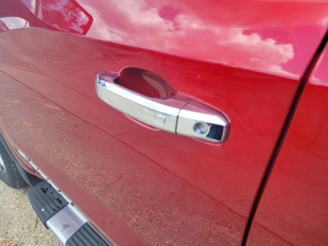 Photo of 2024 Volcanic Red Tintcoat GMC Sierra 1500