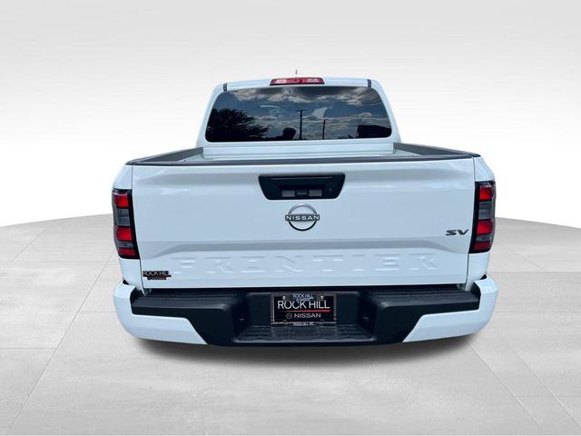 Photo of 2024 Glacier White Nissan Frontier