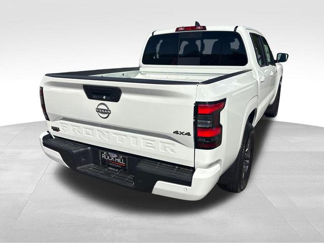 Photo of 2025 Glacier White Nissan Frontier