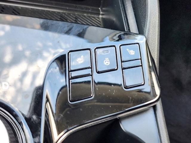 Photo of 2023 Fusion Black Kia Sportage Hybrid