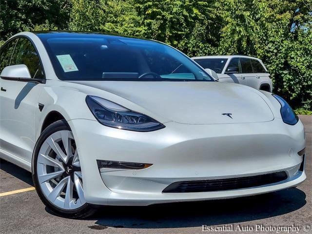 Photo of 2022 Pearl White Multi Tesla Model 3
