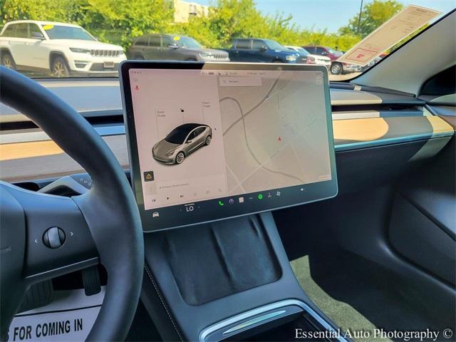 Photo of 2022 Pearl White Multi Tesla Model 3