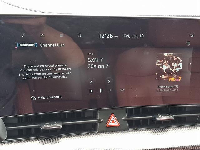 Photo of 2023 Gravity Gray Kia Sportage Hybrid