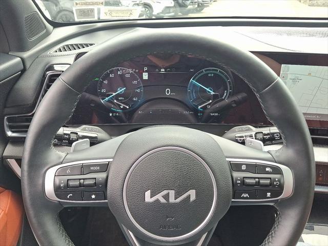 Photo of 2023 Gravity Gray Kia Sportage Hybrid