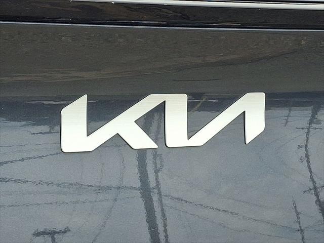 Photo of 2023 Gravity Gray Kia Sportage Hybrid