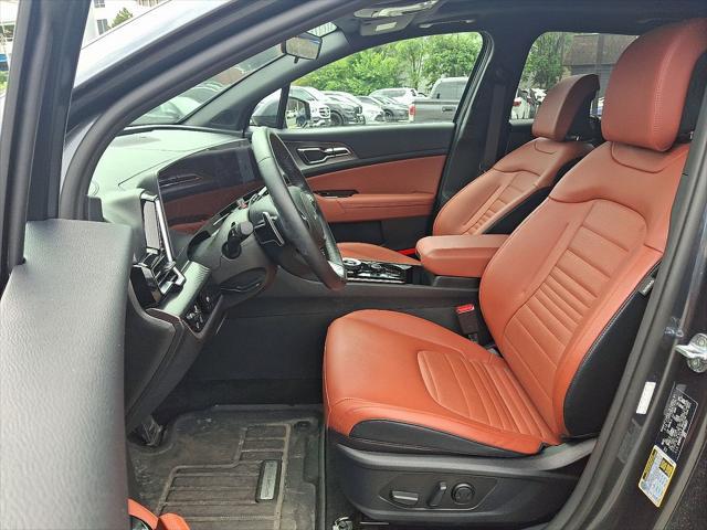 Photo of 2023 Gravity Gray Kia Sportage Hybrid