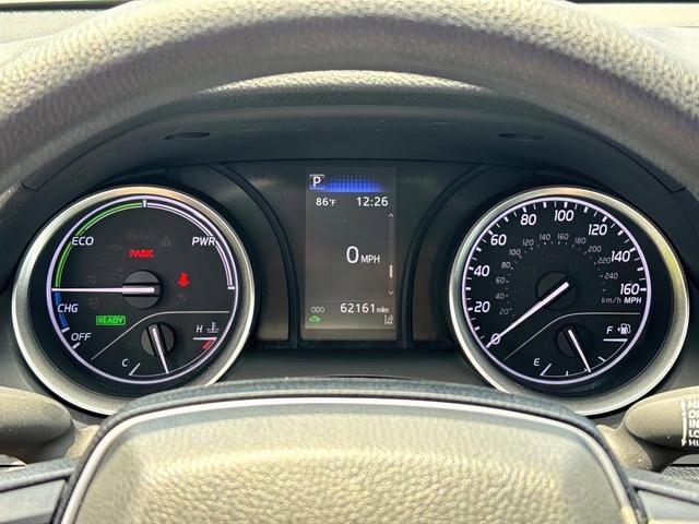 Photo of 2022 White Toyota Camry Hybrid