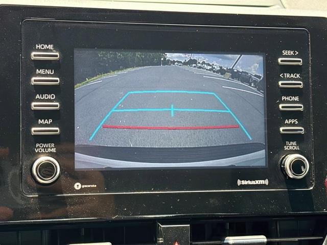 Photo of 2022 White Toyota Camry Hybrid