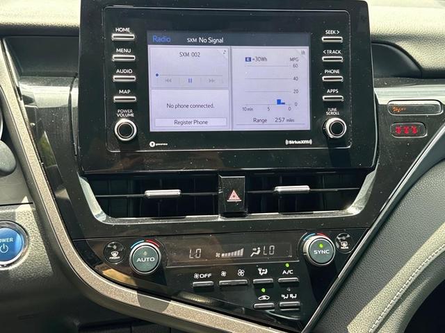 Photo of 2022 White Toyota Camry Hybrid