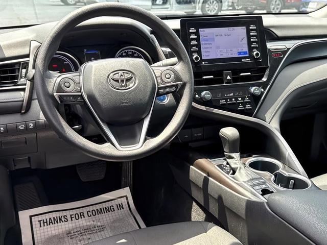 Photo of 2022 White Toyota Camry Hybrid