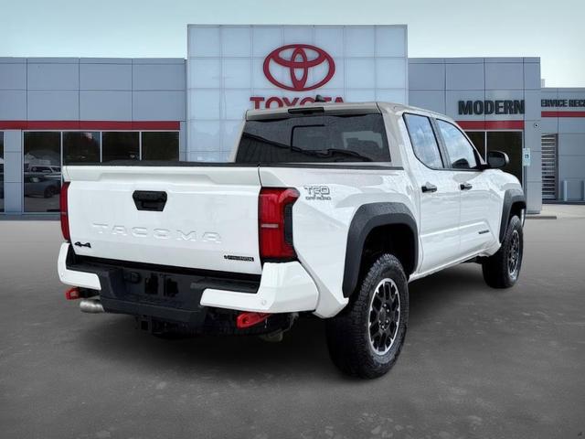Photo of 2025 White Toyota Tacoma Hybrid