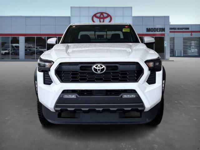 Photo of 2025 White Toyota Tacoma Hybrid