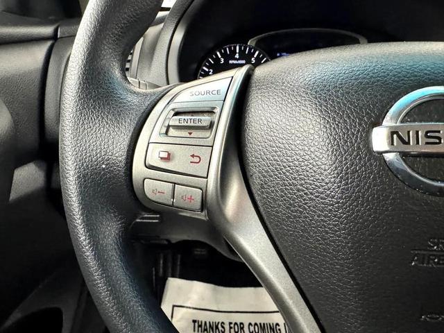 Photo of 2014 Super Black Nissan Altima