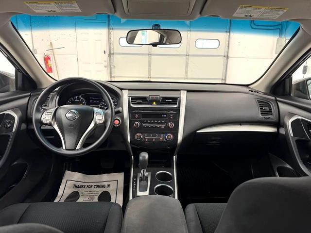 Photo of 2014 Super Black Nissan Altima