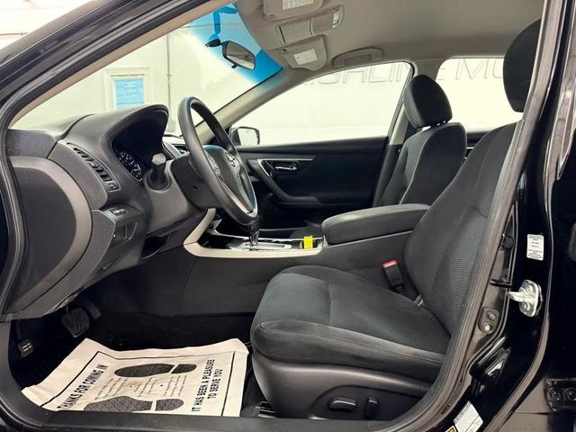 Photo of 2014 Super Black Nissan Altima