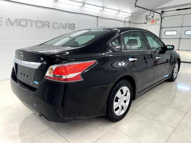 Photo of 2014 Super Black Nissan Altima