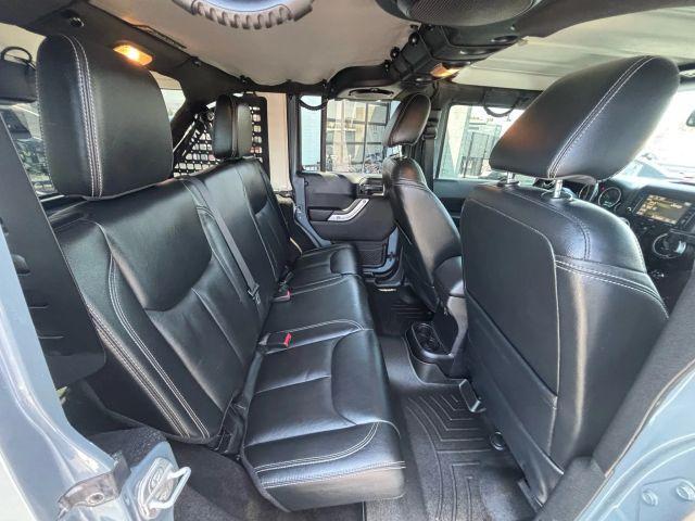 Photo of 2014 Blue Jeep Wrangler Unlimited