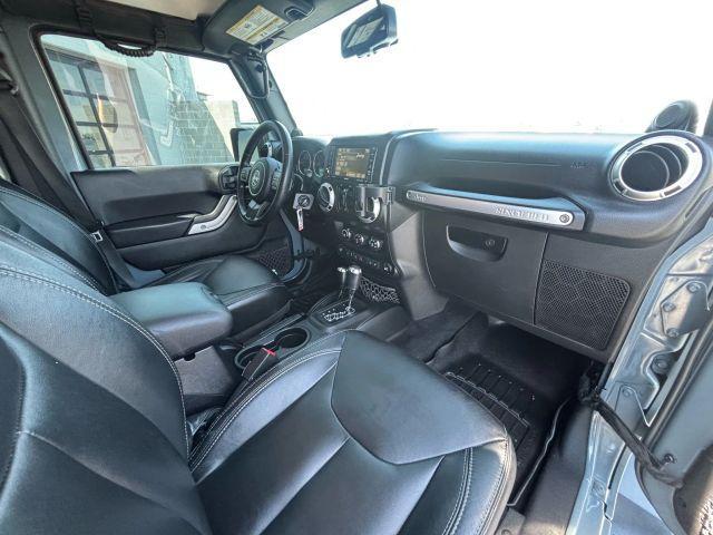 Photo of 2014 Blue Jeep Wrangler Unlimited