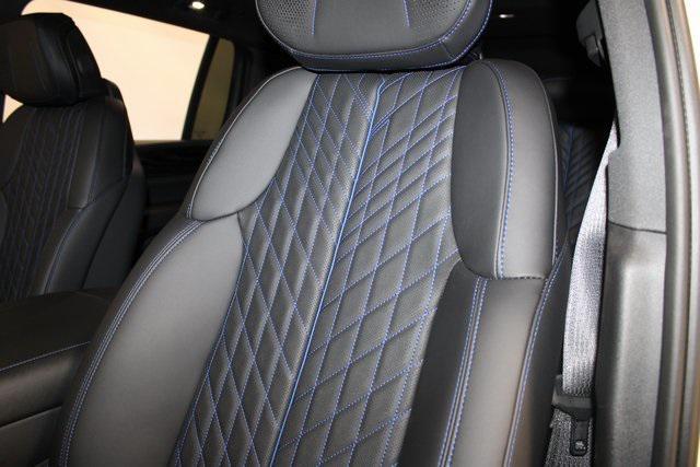 Photo of 2025 Summit White Cadillac Escalade IQ