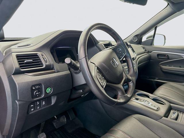 Photo of 2023 Radiant Red Metallic II Honda Passport