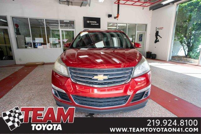 Photo of 2013 Crystal Red Tintcoat Chevrolet Traverse