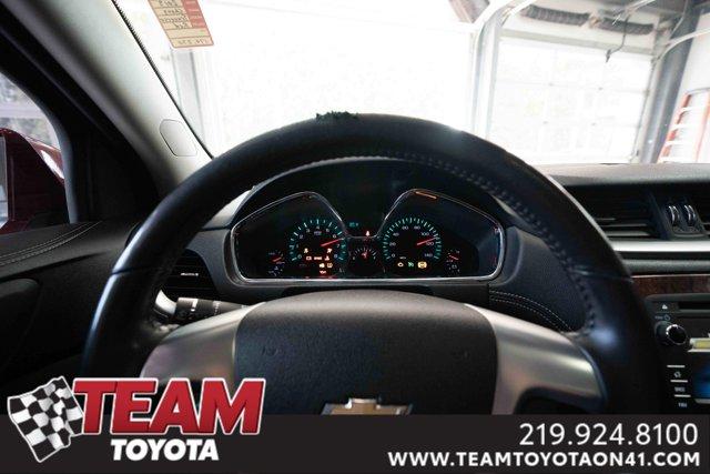 Photo of 2013 Crystal Red Tintcoat Chevrolet Traverse